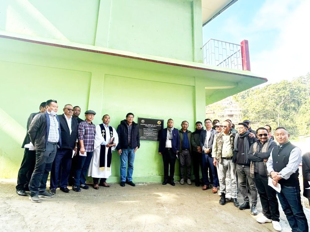 Advisor S Keoshu Yimkhiung accompanied by Advisor Mhathung Yanthan along with other officials and the villagers of Lakhuti during the unveiling of inauguration plaque. (Morung Photo)